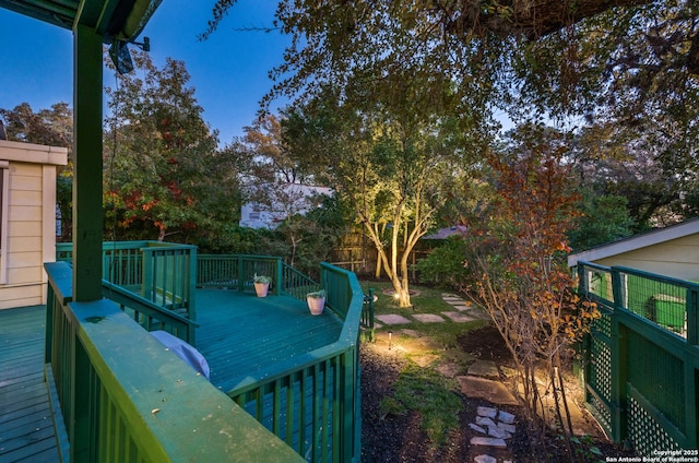 wooden deck featuring fence