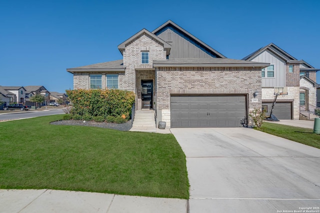 view of front facade with driveway, stone siding, a front yard, board and batten siding, and brick siding