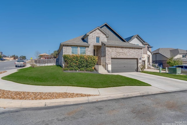 view of front of home with brick siding, board and batten siding, fence, driveway, and a front lawn