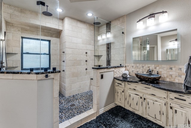 full bath featuring recessed lighting, tasteful backsplash, a walk in shower, and vanity