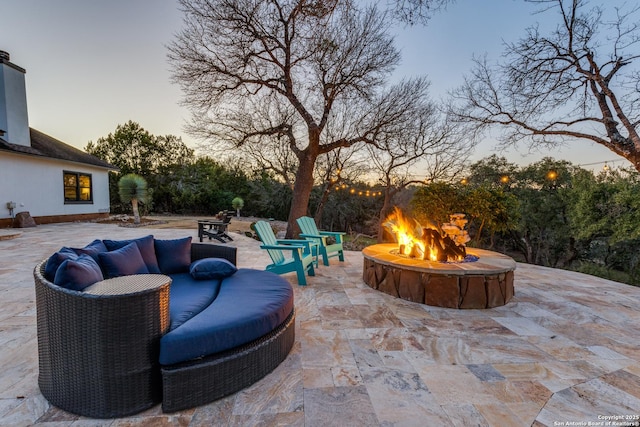 view of patio featuring an outdoor fire pit