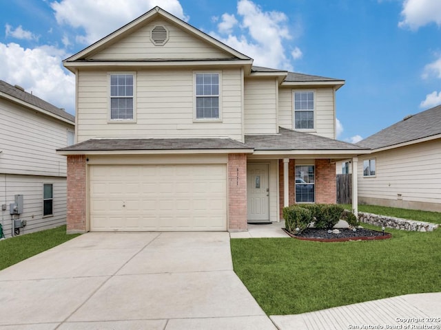 traditional home featuring driveway, a garage, a front yard, and brick siding