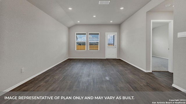 spare room with dark wood-style floors, baseboards, visible vents, and recessed lighting