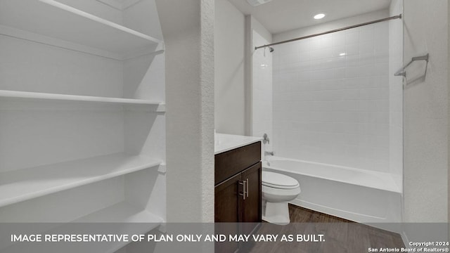 bathroom featuring a textured wall, toilet, wood finished floors, vanity, and  shower combination