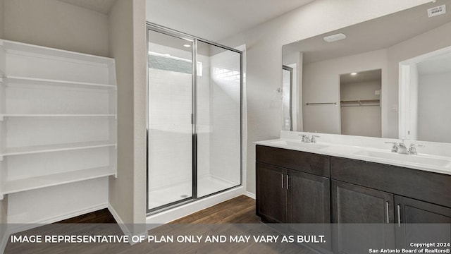 full bathroom with a stall shower, a sink, and visible vents