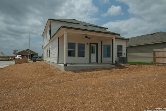 rear view of house with ceiling fan, a patio, and central AC unit