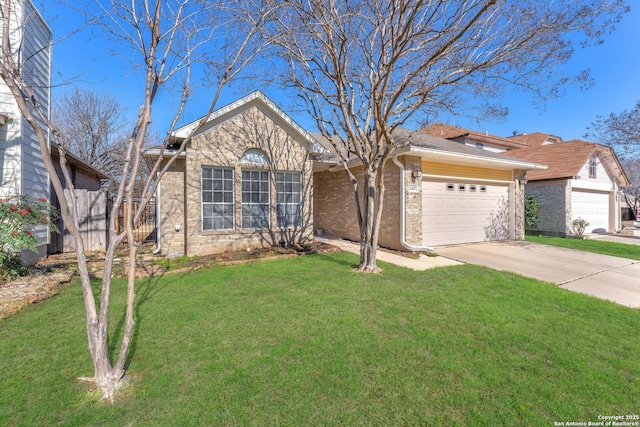 single story home with an attached garage, driveway, brick siding, and a front yard