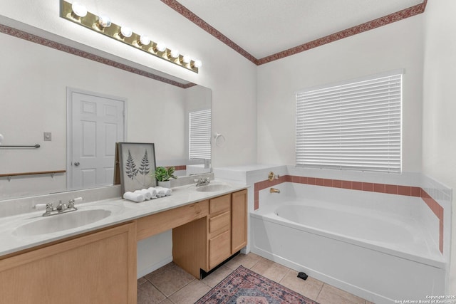 full bathroom featuring double vanity, a sink, and tile patterned floors