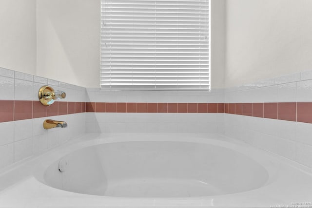 full bathroom featuring a garden tub