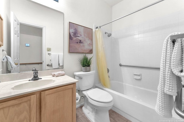 bathroom featuring shower / tub combo, vanity, toilet, and tile patterned floors