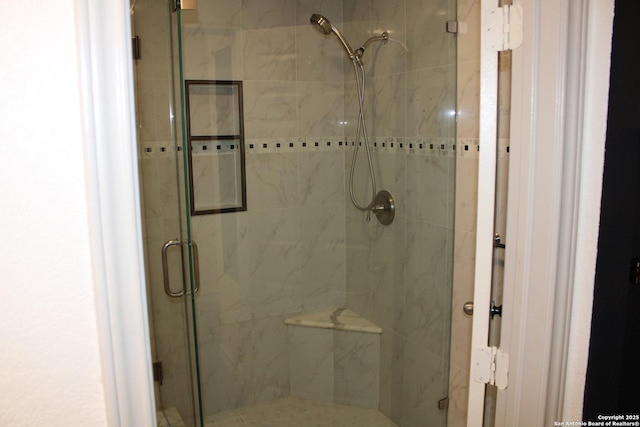 bathroom with a stall shower