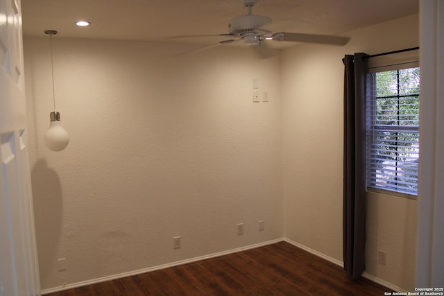 spare room with ceiling fan, baseboards, dark wood-style flooring, and recessed lighting