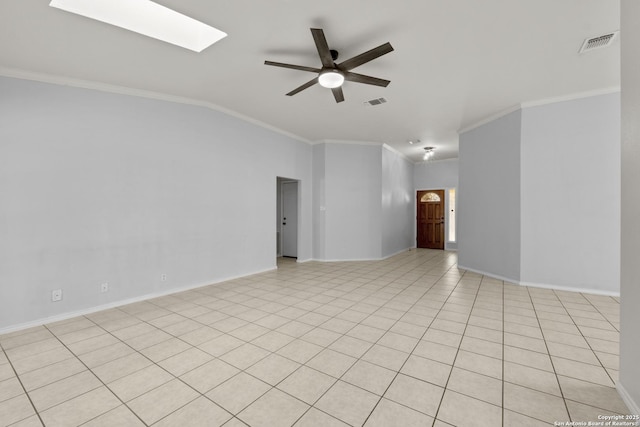 empty room featuring crown molding, visible vents, and ceiling fan