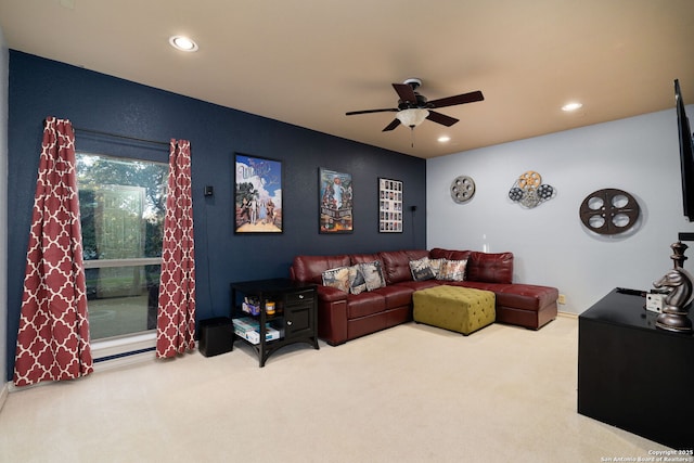 carpeted living room with a ceiling fan and recessed lighting