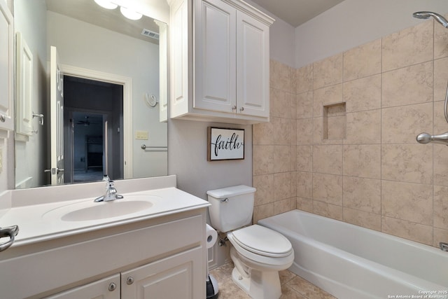 full bath featuring visible vents, toilet, tile patterned floors, vanity, and shower / washtub combination