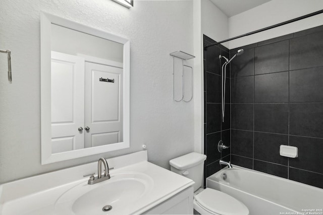 full bath featuring toilet, washtub / shower combination, and vanity