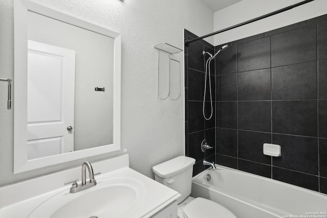 full bath featuring toilet, shower / bathing tub combination, and vanity