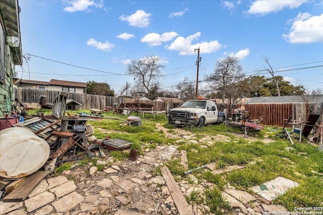 view of yard with fence