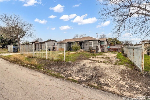 view of front of house featuring fence