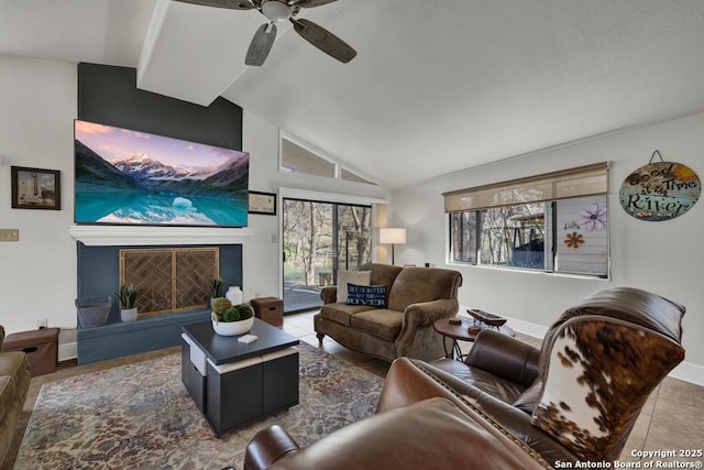 tiled living area featuring high vaulted ceiling, plenty of natural light, baseboards, and a fireplace with raised hearth