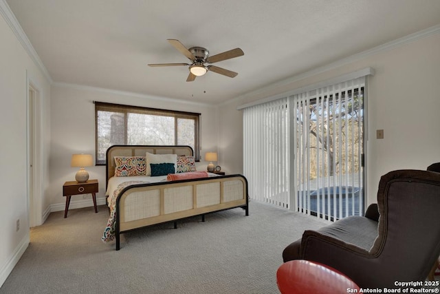 carpeted bedroom featuring baseboards, access to outside, a ceiling fan, and crown molding