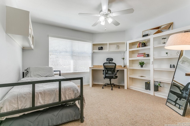 bedroom with light carpet and ceiling fan