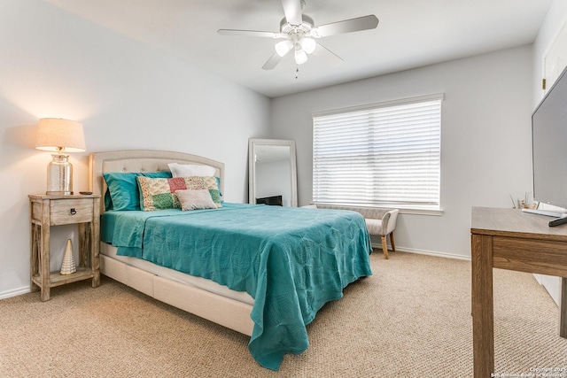 bedroom featuring ceiling fan, baseboards, and carpet flooring