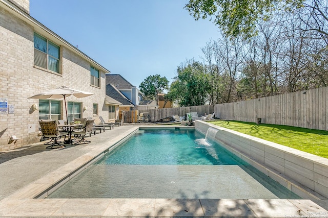 view of pool with a fenced backyard, a lawn, a fenced in pool, and a patio