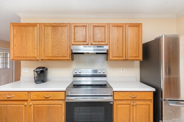 kitchen featuring crown molding, stainless steel appliances, light countertops, and under cabinet range hood