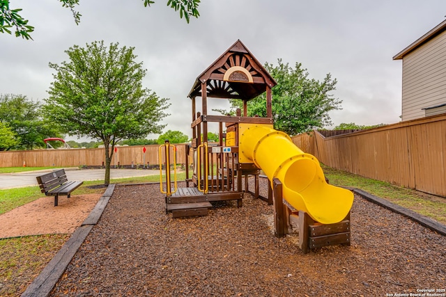 view of play area featuring fence