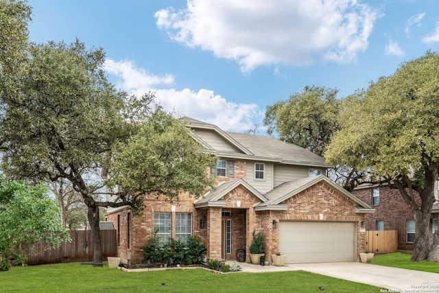 view of front of house with a garage, a front yard, brick siding, and fence