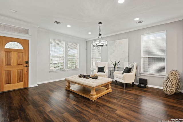 interior space featuring recessed lighting, crown molding, baseboards, and wood finished floors