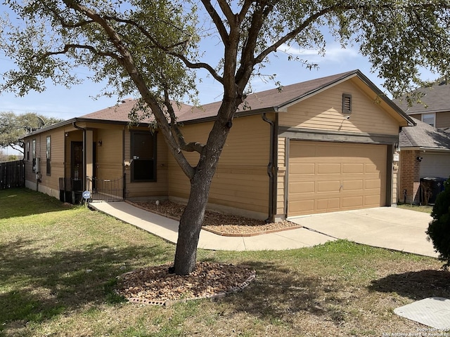 ranch-style home with a garage, driveway, a front lawn, and fence