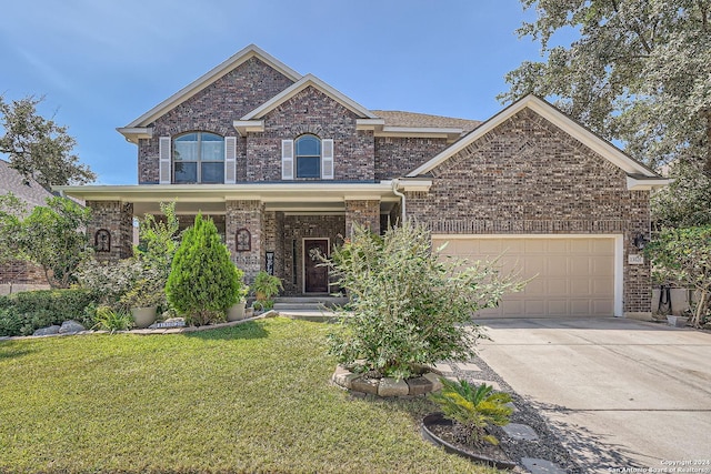 view of front facade with a garage, concrete driveway, brick siding, and a front lawn