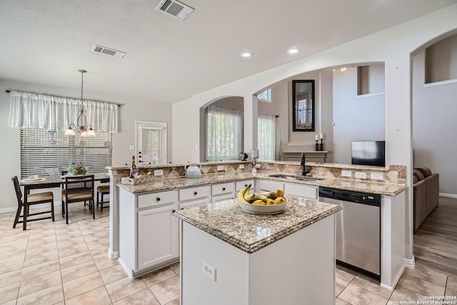 13026 Gordons Knl, San Antonio, TX 78253 - kitchen with a sink, white cabinetry, visible vents, and dishwasher