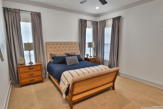 bedroom featuring light colored carpet, ceiling fan, and baseboards