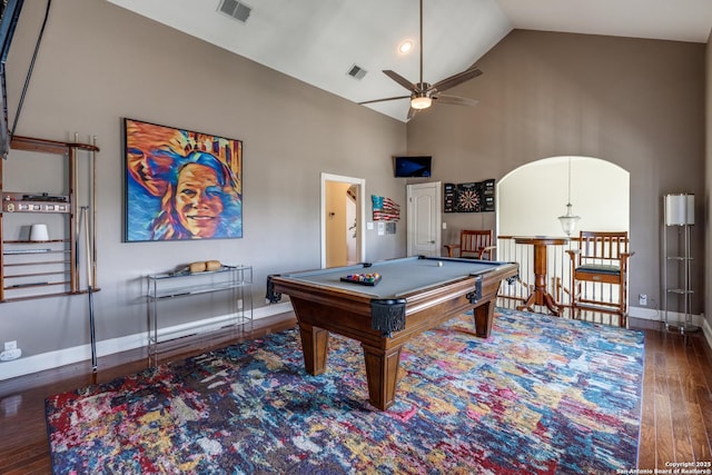 rec room with high vaulted ceiling, baseboards, visible vents, and wood finished floors