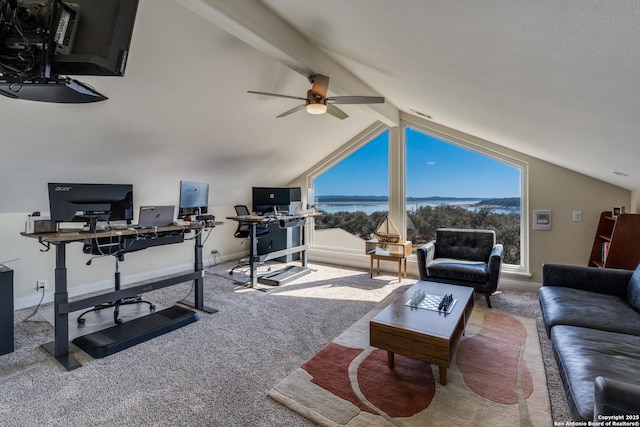 carpeted living area featuring vaulted ceiling with beams, baseboards, and a ceiling fan