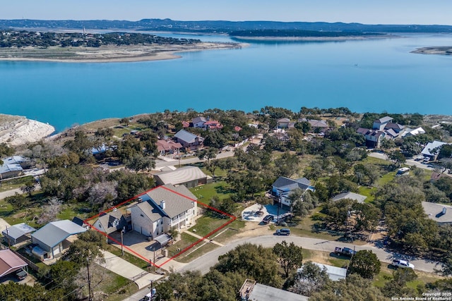 aerial view with a water view and a residential view