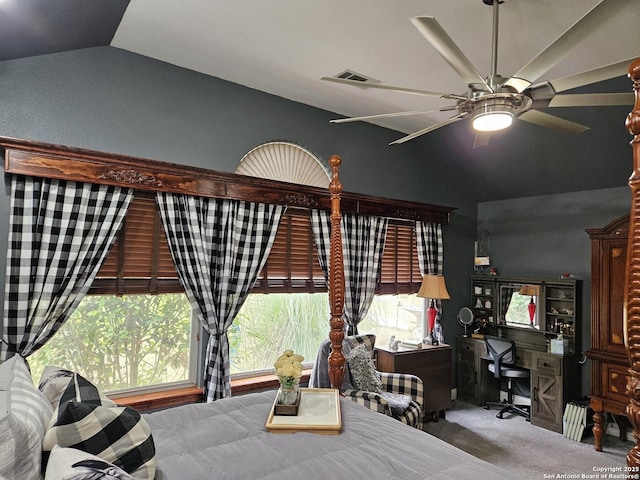 carpeted bedroom featuring vaulted ceiling, visible vents, and a ceiling fan