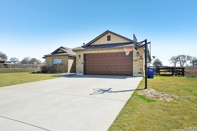 ranch-style home featuring driveway, stone siding, a garage, and a front yard