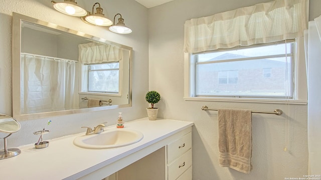 full bathroom featuring vanity