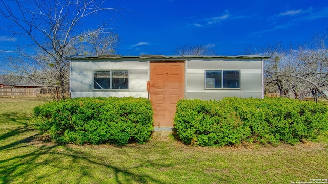 exterior space with a yard