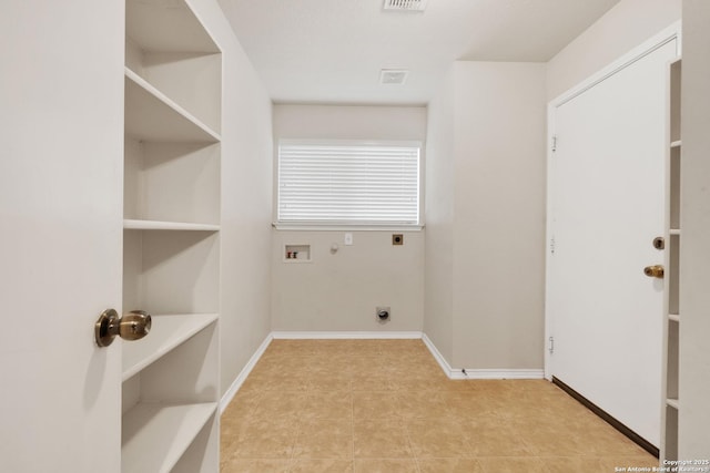 laundry area with hookup for a washing machine, hookup for a gas dryer, hookup for an electric dryer, laundry area, and baseboards