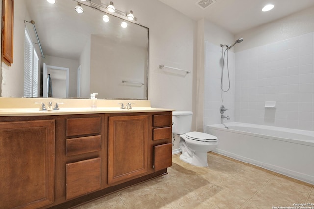 bathroom with toilet, a sink, visible vents, shower / bathing tub combination, and double vanity