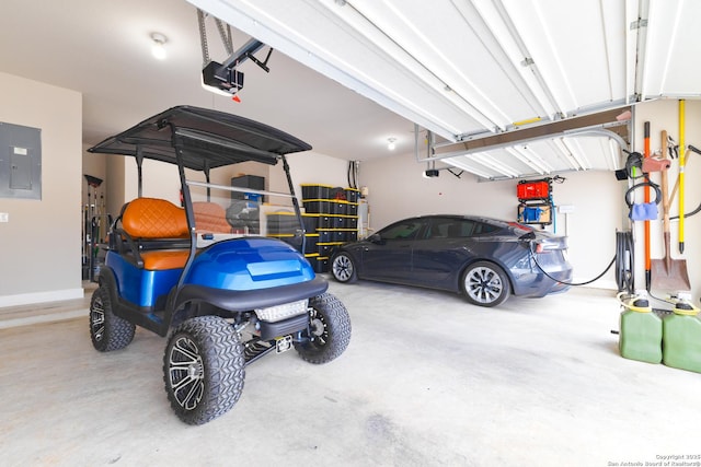 garage with electric panel and a garage door opener