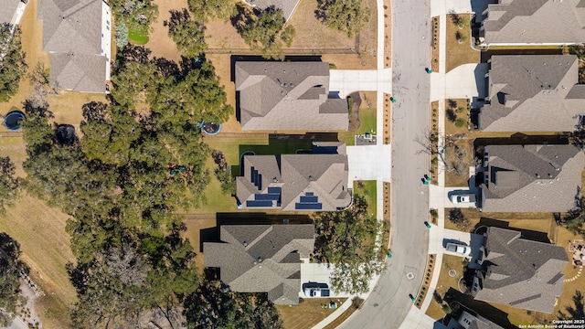 birds eye view of property with a residential view