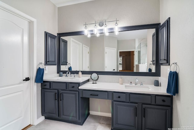 full bath with a sink and double vanity