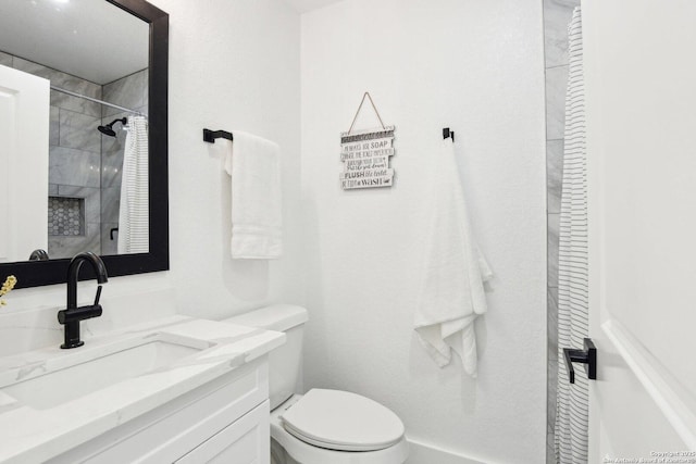 full bath with a shower, vanity, and toilet