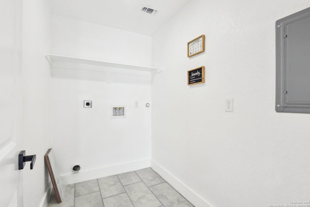 clothes washing area featuring laundry area, electric panel, baseboards, hookup for a washing machine, and hookup for an electric dryer